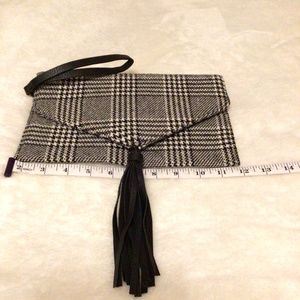 Carlos Santana clutch/ wristlet black and white